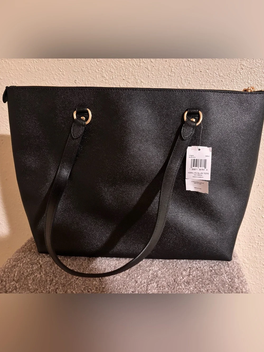 Coach Black Leather Tote with Gold Accents